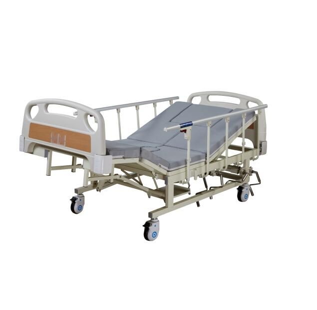 Manual commode care bed