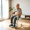 Elderly user seated in an ALK850H hydraulic transfer chair for home care